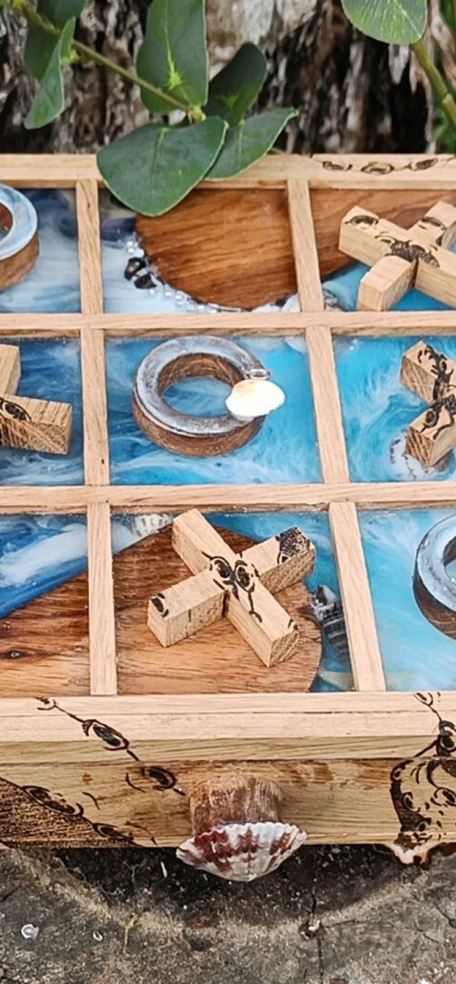 Niymaea jeux bois revisite tic tact toe mer